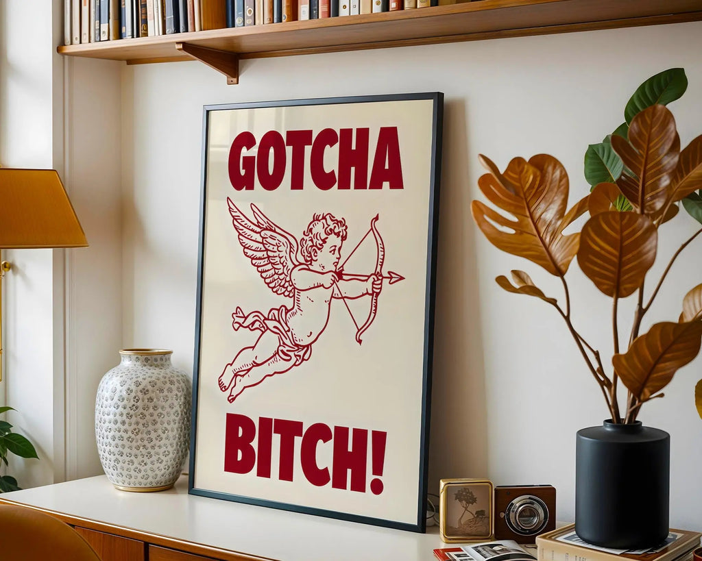 Positive Emotion | Gotcha Bitch Cupid Wall Art | Bold Vintage Illustration | Cheeky Statement Poster wall art print, modern home decor, unframed artwork by Nomad & Nest
