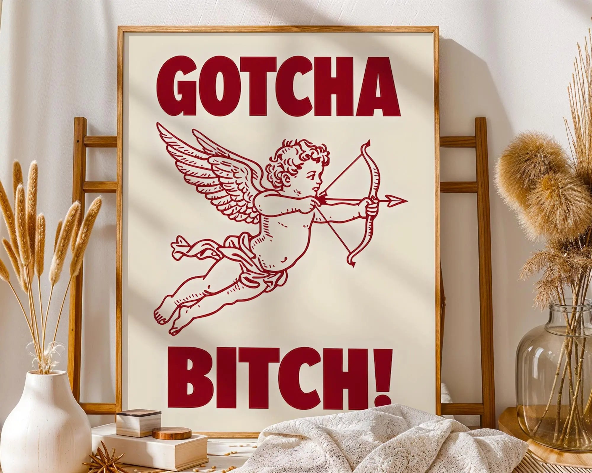 Positive Emotion | Gotcha Bitch Cupid Wall Art | Bold Vintage Illustration | Cheeky Statement Poster wall art print, modern home decor, unframed artwork by Nomad & Nest